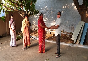 Distribution of basic amenities to the poor people for COVID-19